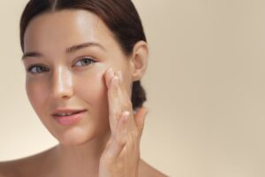 Woman enjoying glowing, healthy skin after a chemical peel